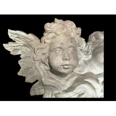Anjo de pedra sabão semelhante aos anjos da fachada da Igreja São Francisco de Assis 